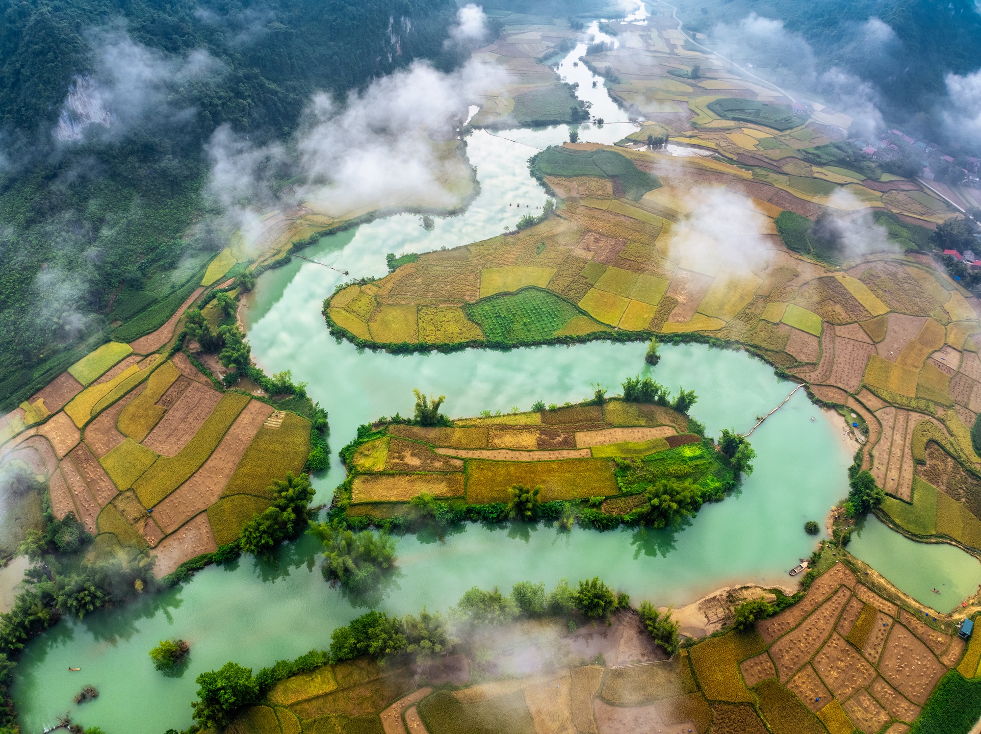 Aerial drone view of rice terrace paddle field around the river at Phong Nam, Cao Bang, Vietnam