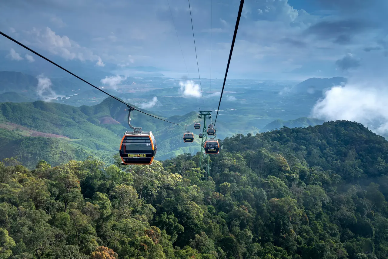 Ba Na Hills 2026: The Ultimate A-Z Travel Guide for a Perfect Trip 11 Ba Na Hills cable car system crossing above tropical forest canopy