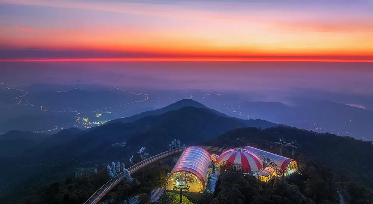 Ba Na Hills 2026: The Ultimate A-Z Travel Guide for a Perfect Trip 2 Ba Na Hills panoramic sunrise view over mountaintop resort with clouds below