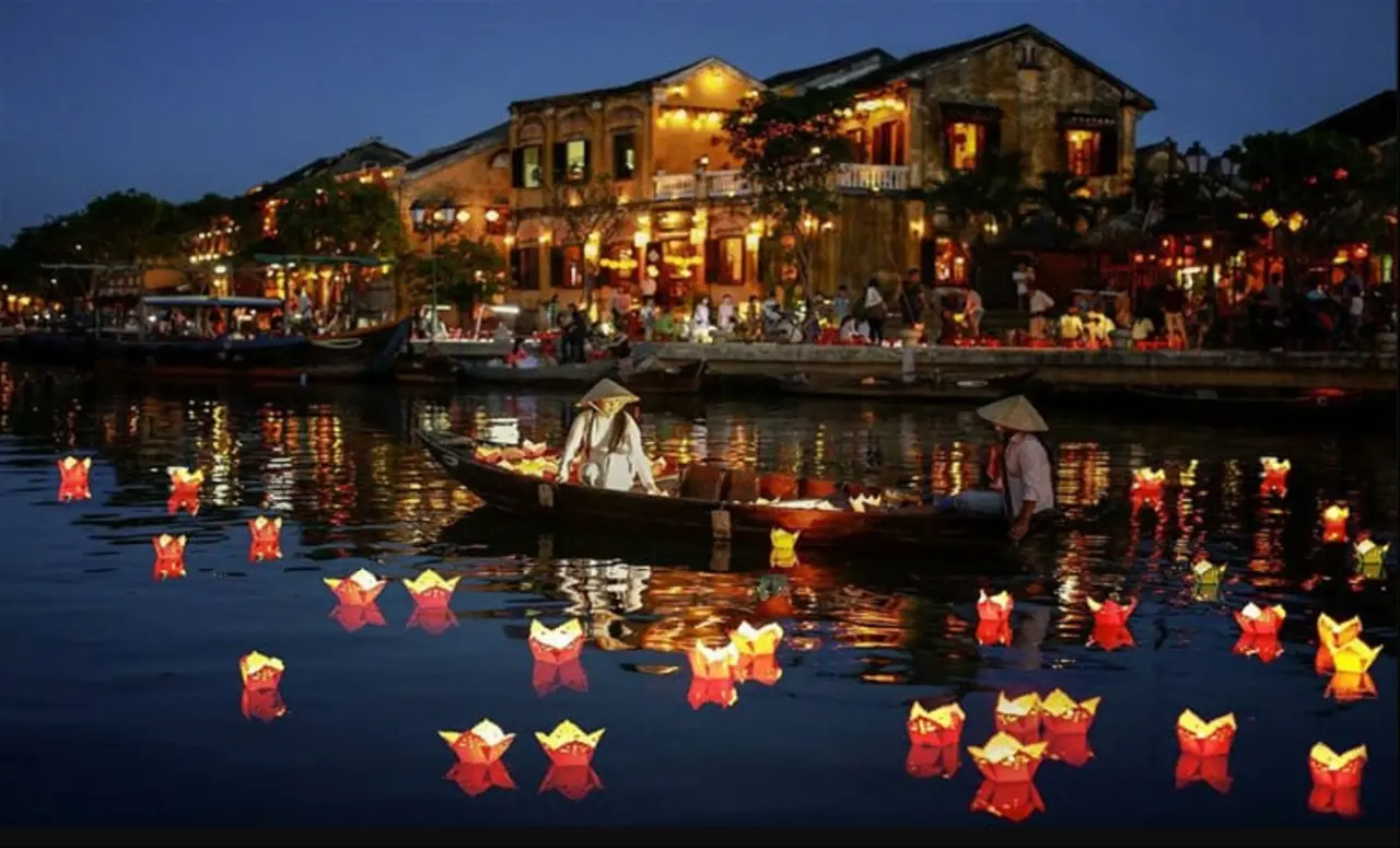 Da Nang Travel Guide 2026: 15 Best Things to Do, Itineraries & Insider Tips for Vietnam's Coastal Gem 10 Hoi An Ancient Town lanterns at night with colorful floating lanterns on river and illuminated buildings