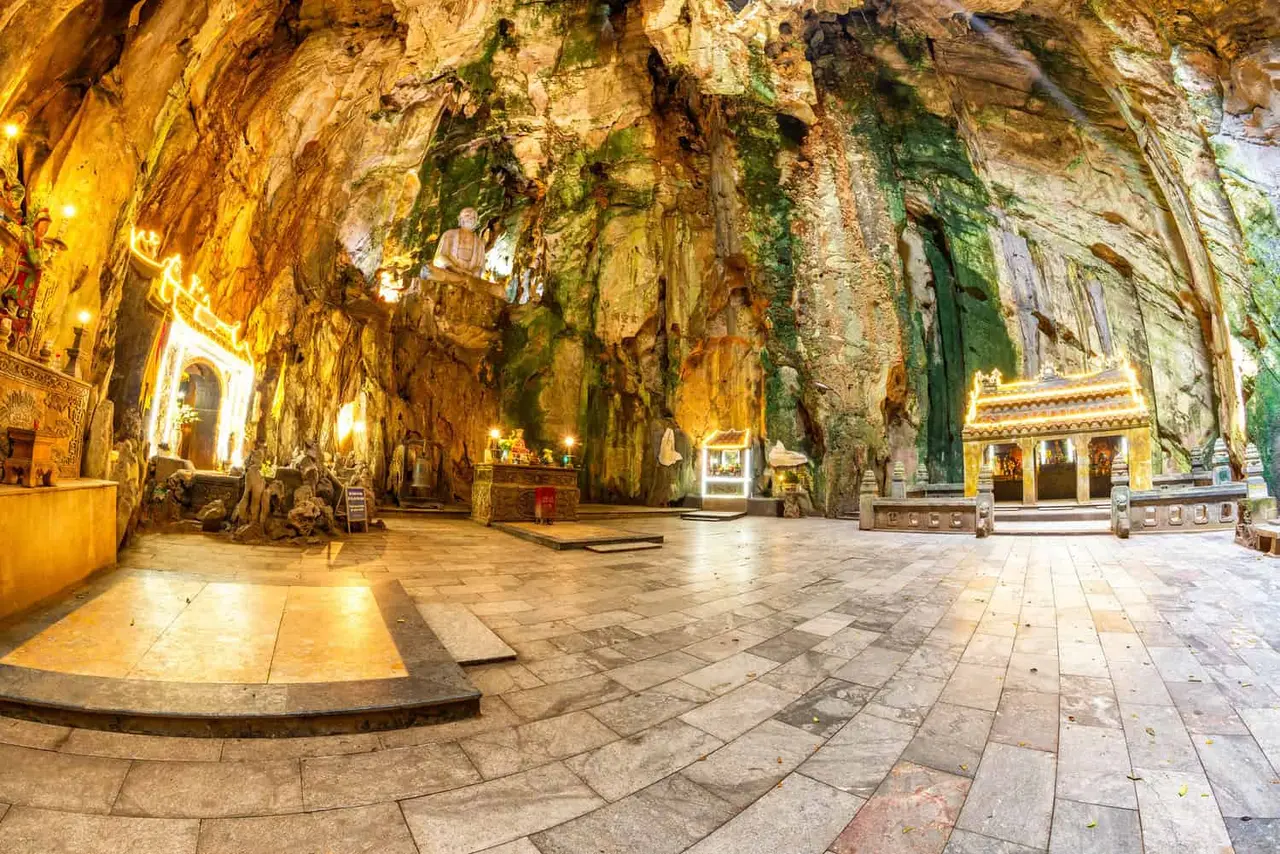 Da Nang Travel Guide 2026: 15 Best Things to Do, Itineraries & Insider Tips for Vietnam's Coastal Gem 7 Marble Mountains Da Nang limestone cave interior with Buddhist pagoda and shrine