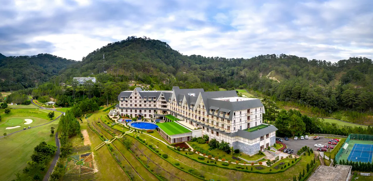 Ba Na Hills 2026: The Ultimate A-Z Travel Guide for a Perfect Trip 15 Mercure French Village hotel mountain resort aerial view